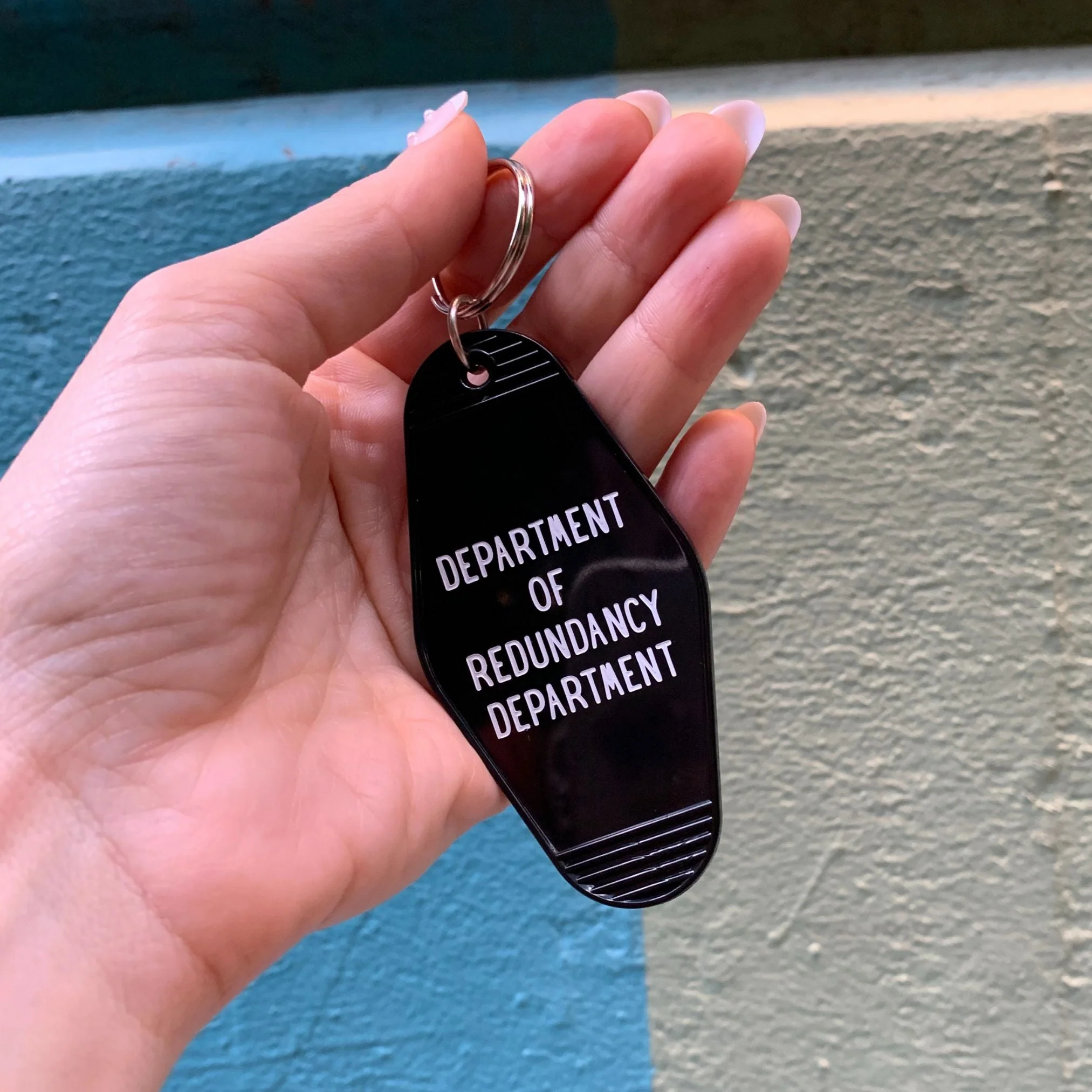 Department of Redundancy Department Motel Style Keychain in Black - Image 2