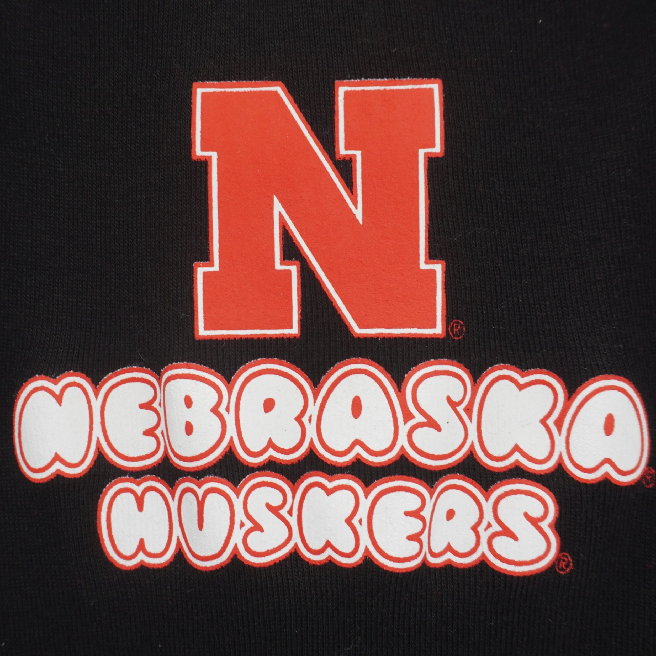 Nebraska Huskers N Onesie | Black | Multiple Sizes | Lou's Sporting Goods | 25N5IC - Image 3